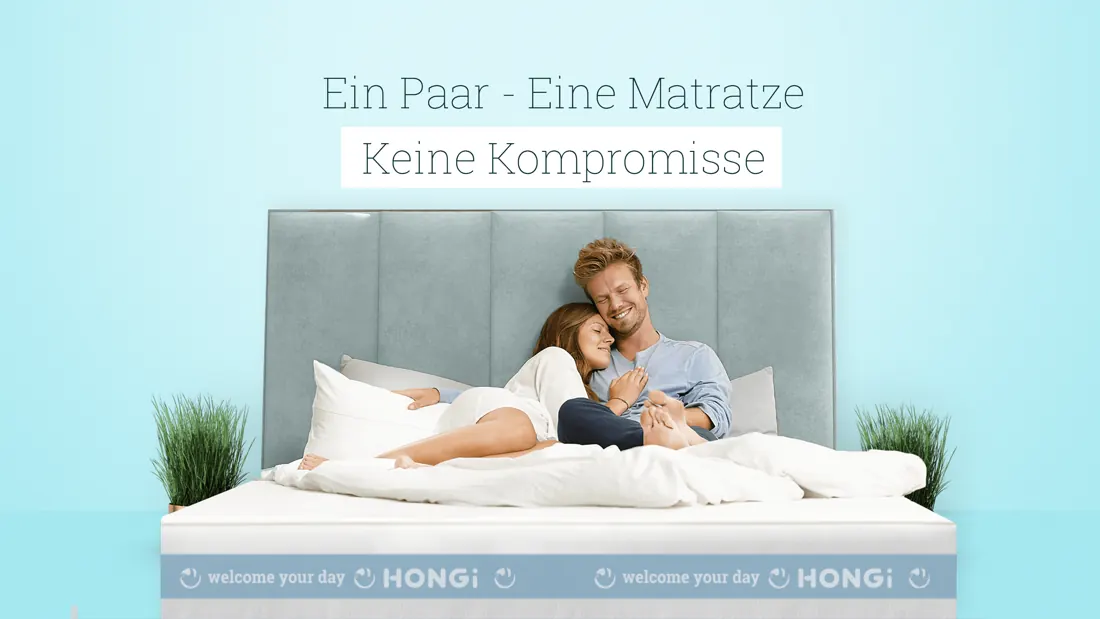 Paar auf einer Matratze